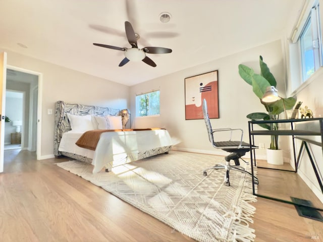 bedroom featuring ceiling fan and wood-type flooring