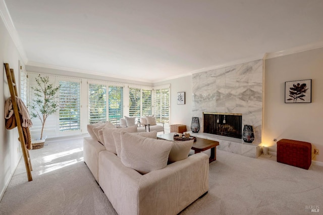 carpeted living room with a tile fireplace and crown molding