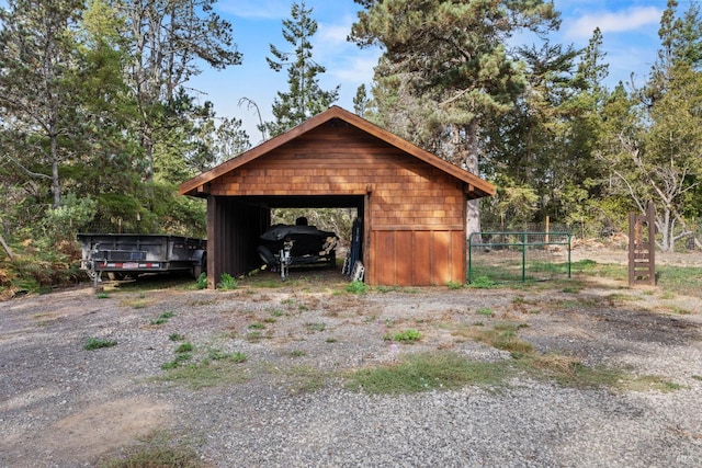 view of outdoor structure with a carport