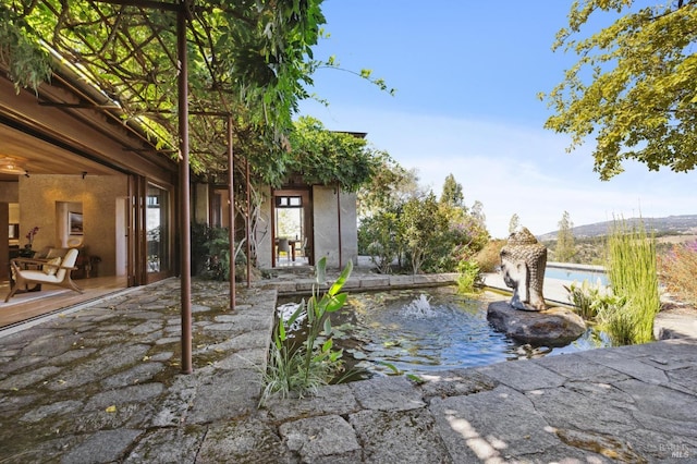 outdoor pool featuring a patio