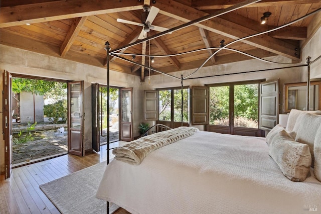 bedroom featuring beamed ceiling, high vaulted ceiling, wood ceiling, wood-type flooring, and access to outside