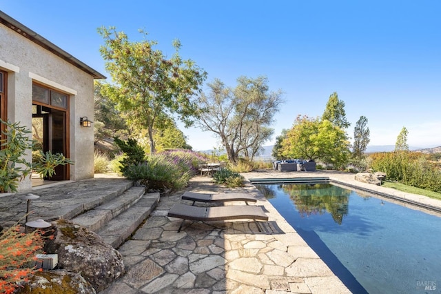 pool with a patio