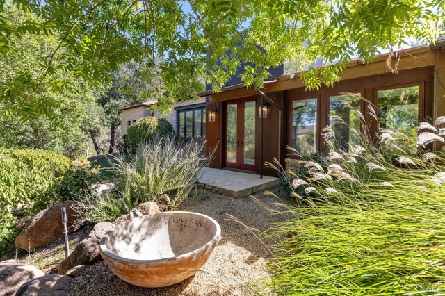 entrance to property featuring french doors