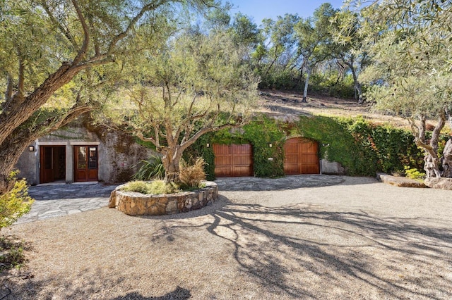 view of front of home with a gate