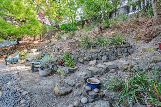 view of yard with fence