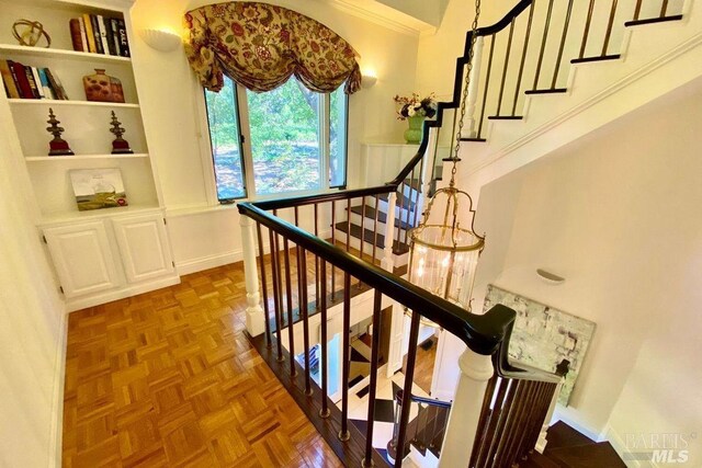 staircase with parquet floors