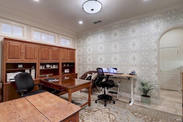 office featuring arched walkways, visible vents, crown molding, and wallpapered walls