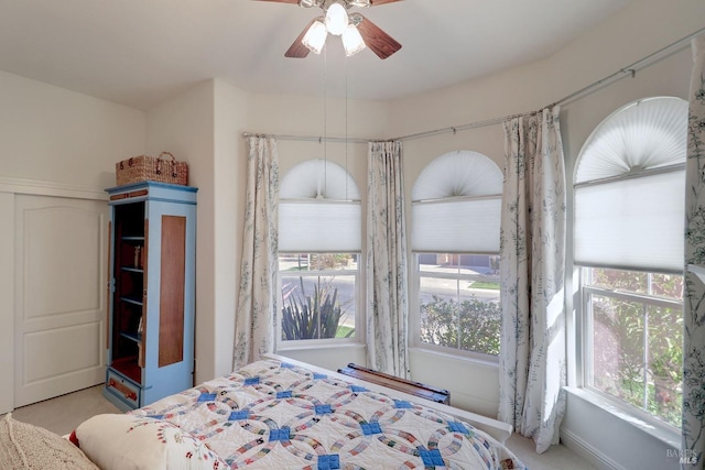 unfurnished bedroom featuring a ceiling fan