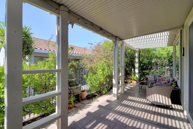 view of patio featuring fence and a pergola