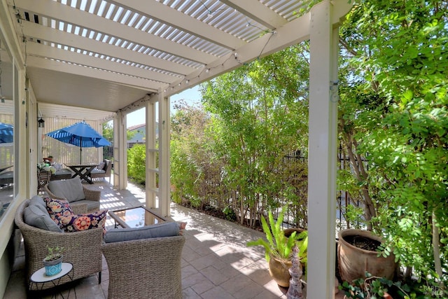 view of patio / terrace with a pergola and an outdoor hangout area