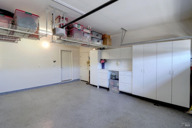 garage with baseboards