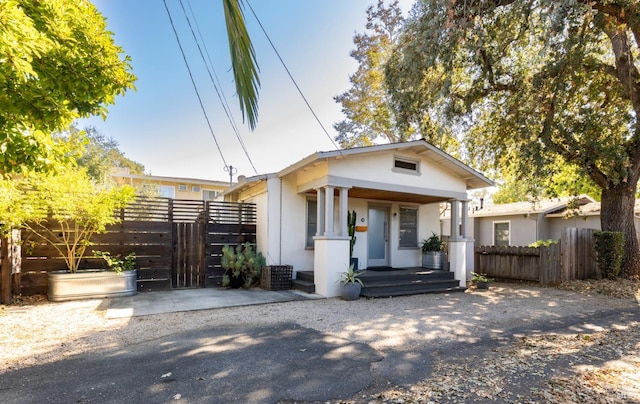 bungalow-style home with covered porch