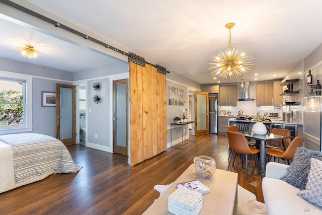 living room featuring a notable chandelier and dark wood-type flooring