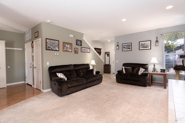 living room with light hardwood / wood-style flooring