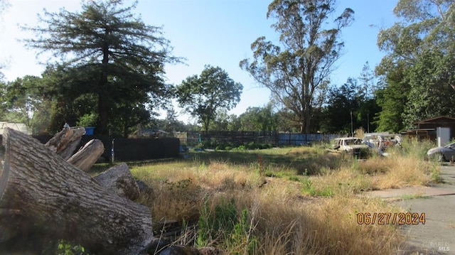 view of yard with fence