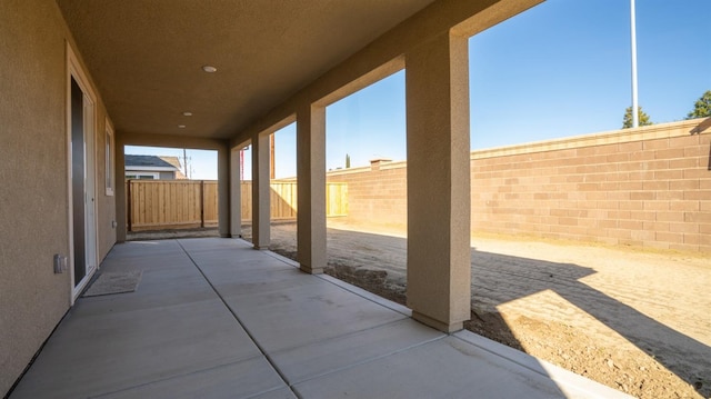 view of patio with a fenced backyard
