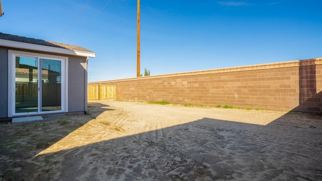 view of yard featuring a fenced backyard