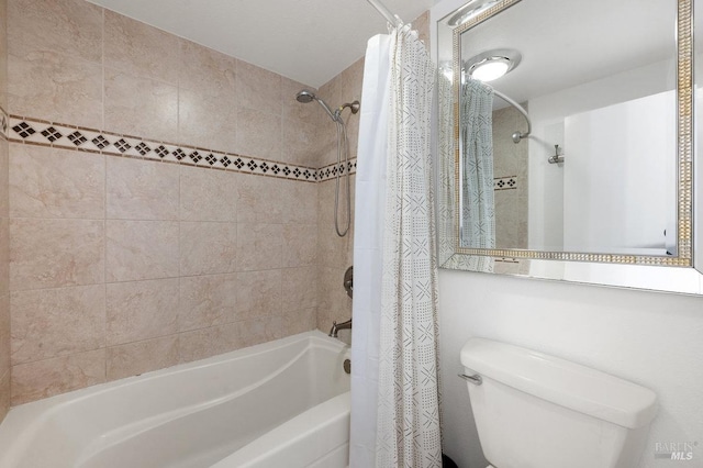 bathroom featuring toilet and shower / tub combo