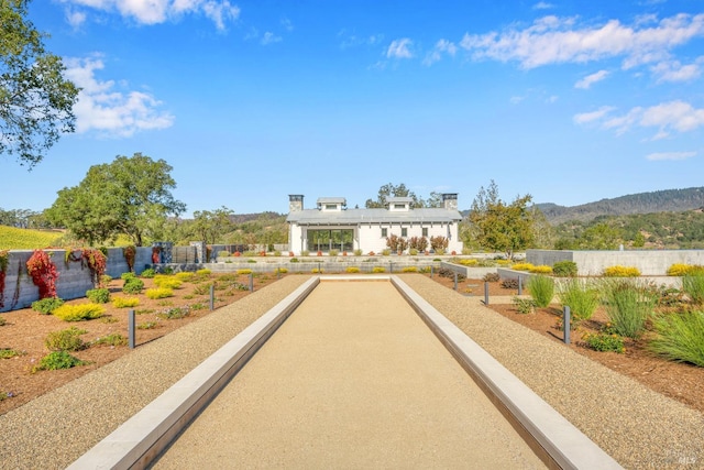 surrounding community with a mountain view