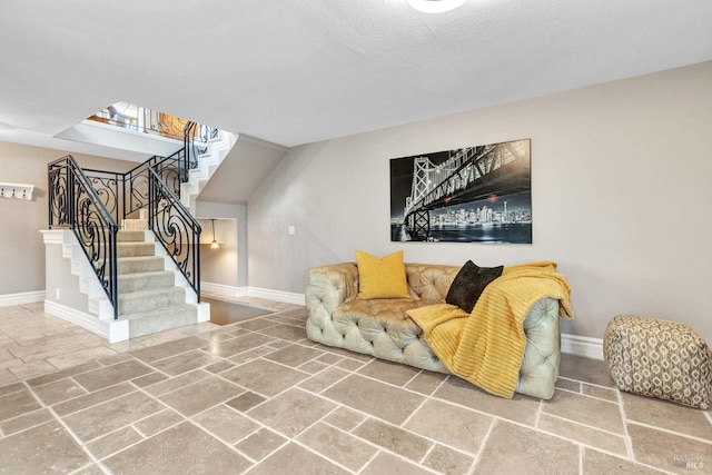 living room with a textured ceiling