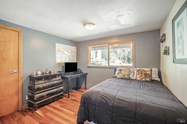 bedroom featuring hardwood / wood-style floors