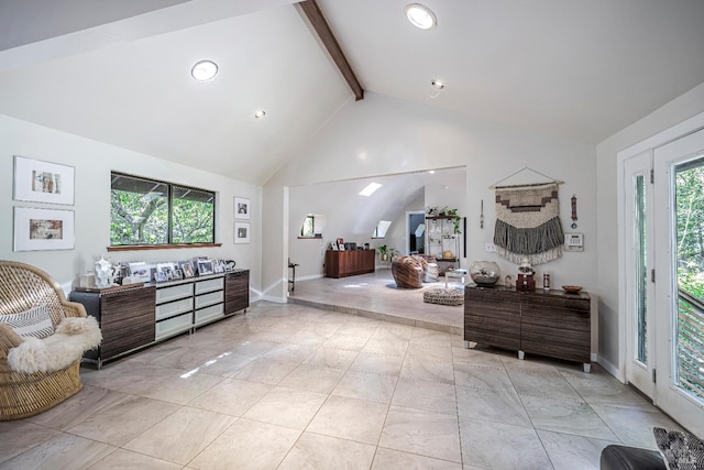 interior space featuring beamed ceiling and high vaulted ceiling