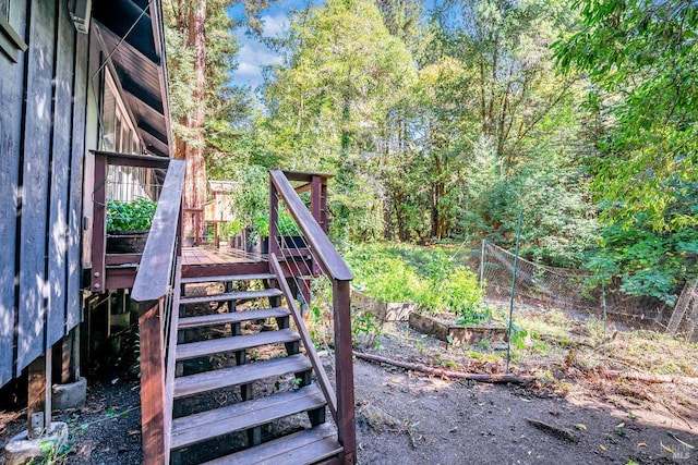 view of yard with a wooden deck