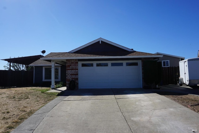 ranch-style house featuring a garage