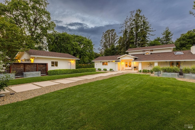 view of front of home with a front lawn