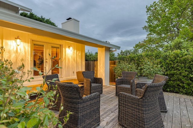 view of patio with french doors and a deck