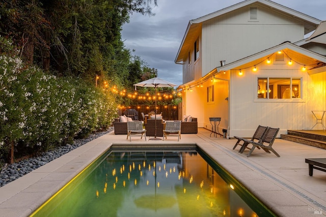 view of pool featuring a patio area and an outdoor hangout area