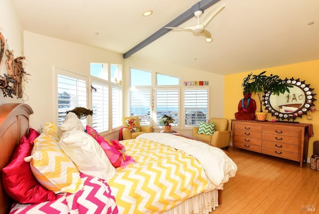 bedroom featuring vaulted ceiling with beams, recessed lighting, and light wood-style flooring