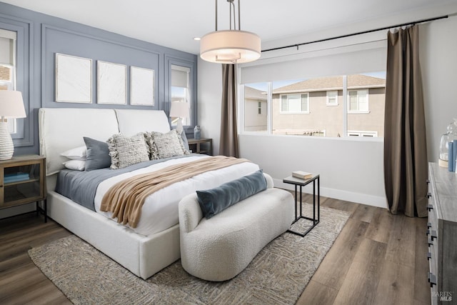 bedroom with wood-type flooring