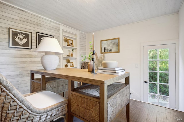 office featuring wooden ceiling, wood finished floors, and built in features