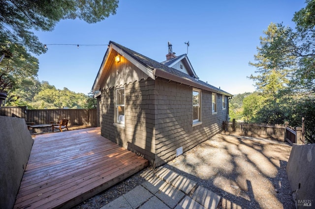 wooden deck featuring fence