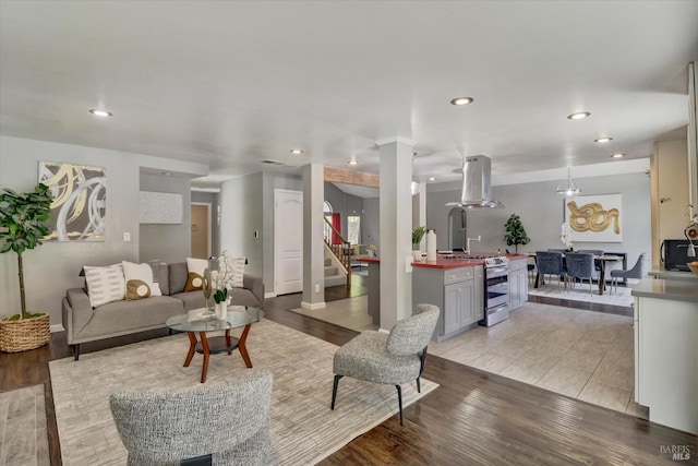 living room with light hardwood / wood-style floors