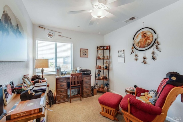 office with light colored carpet and ceiling fan