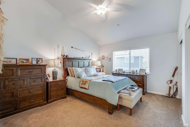 carpeted bedroom with high vaulted ceiling and ceiling fan