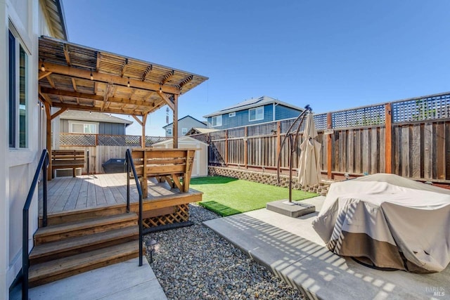 view of yard featuring a pergola and a deck