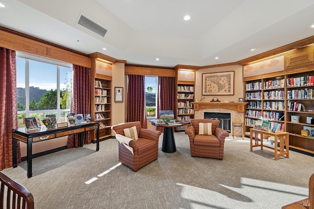 living area with light carpet