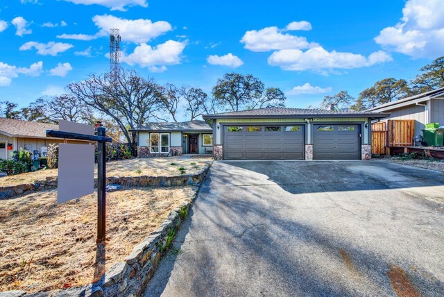 ranch-style home with a garage