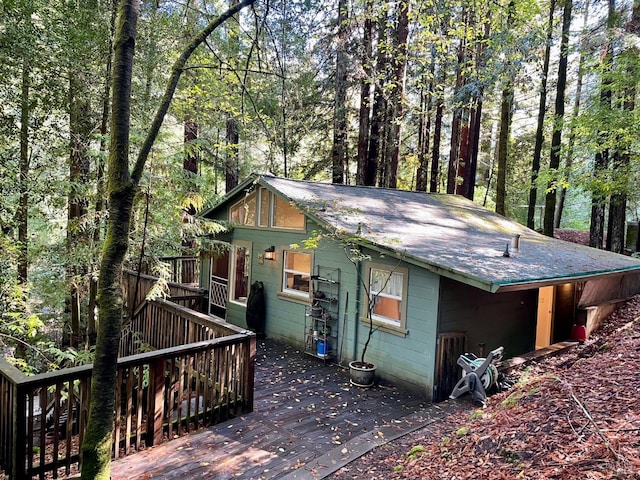 view of home's exterior featuring a deck