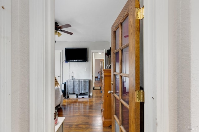 corridor with dark wood-type flooring