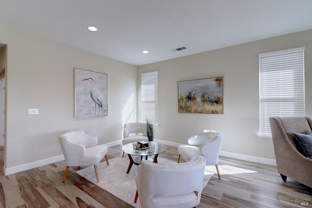 sitting room with light hardwood / wood-style floors