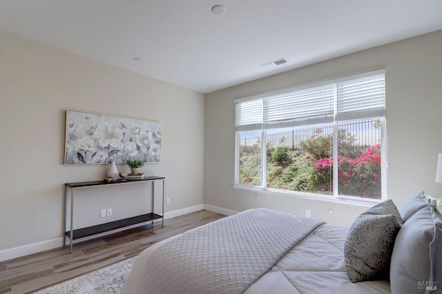 bedroom featuring light hardwood / wood-style floors