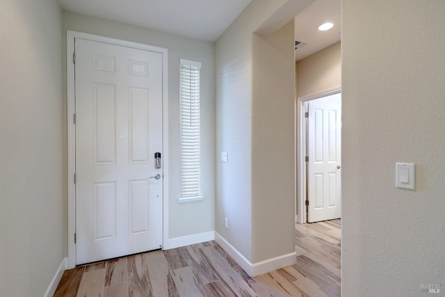 foyer featuring light hardwood / wood-style flooring