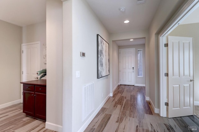 hallway featuring light hardwood / wood-style floors