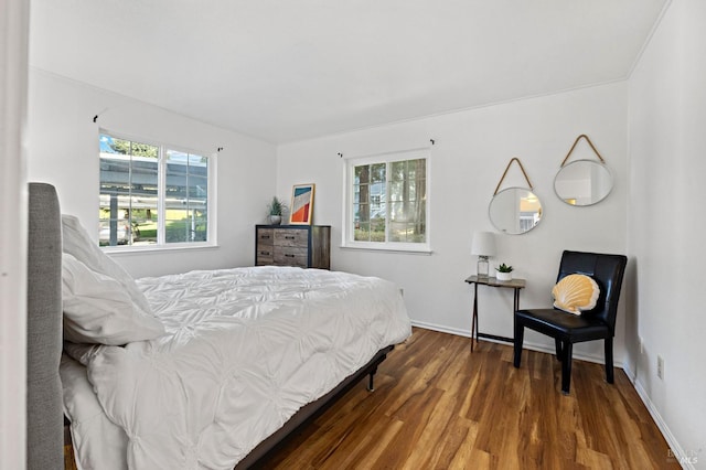 bedroom featuring dark hardwood / wood-style floors