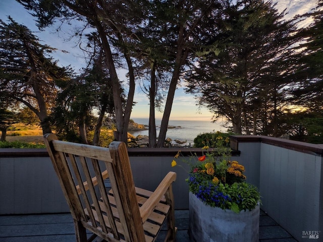 deck at dusk with a water view