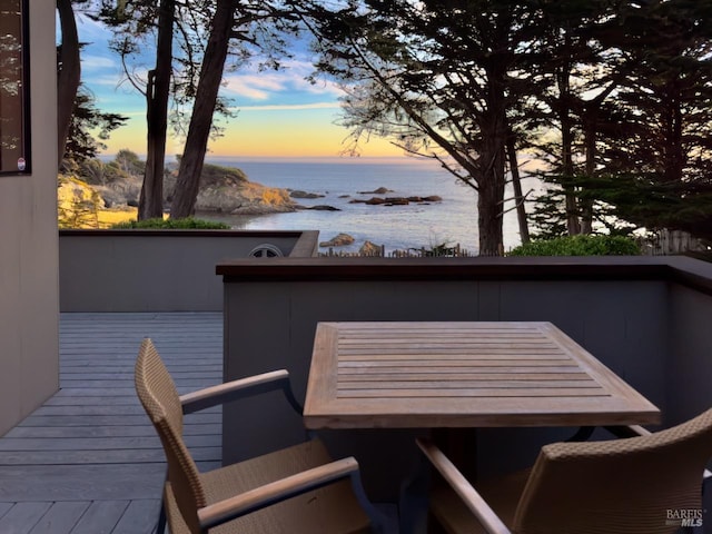 deck at dusk with a water view